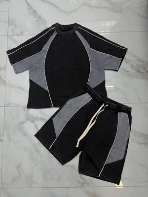 Completo corto oversize stone wash nero