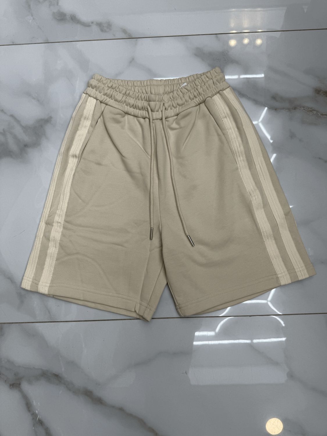Pantaloncini tuta con strisce laterali BAMBINO beige