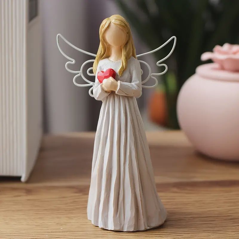 Classic resin angel statue with heart