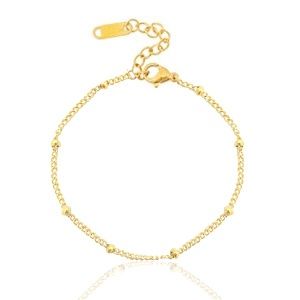 Armband stainless steel goud bolletjes