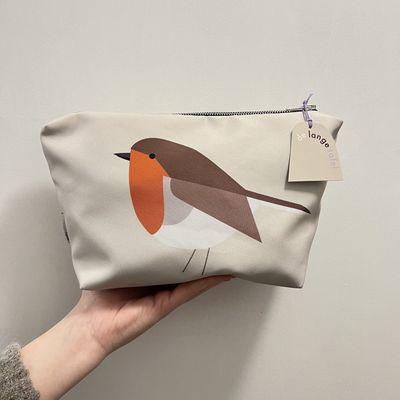Toilettas · roodborst