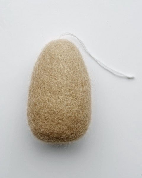 Eitje van vilt pasen · sand