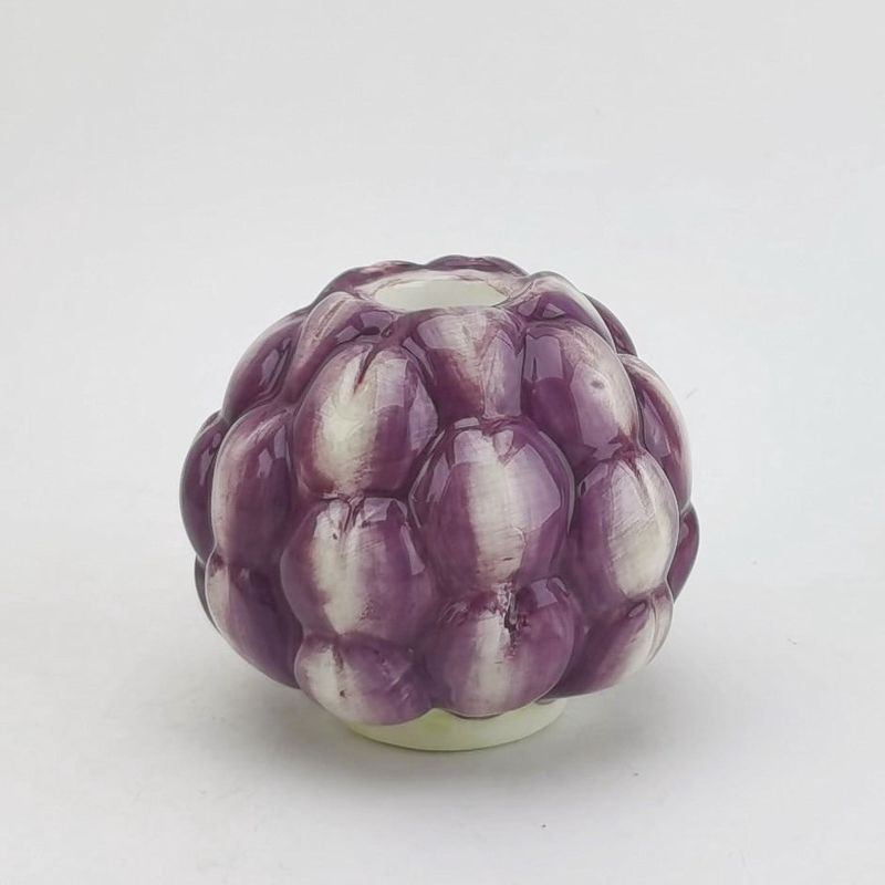 Aardewerk kaarsenstandaard · artichok
