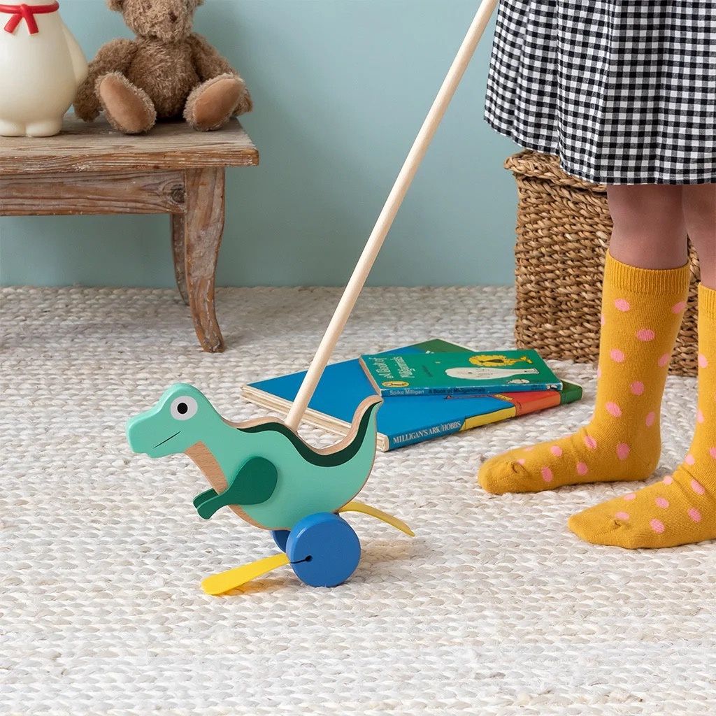REX · Houten trekspeelgoed - dino