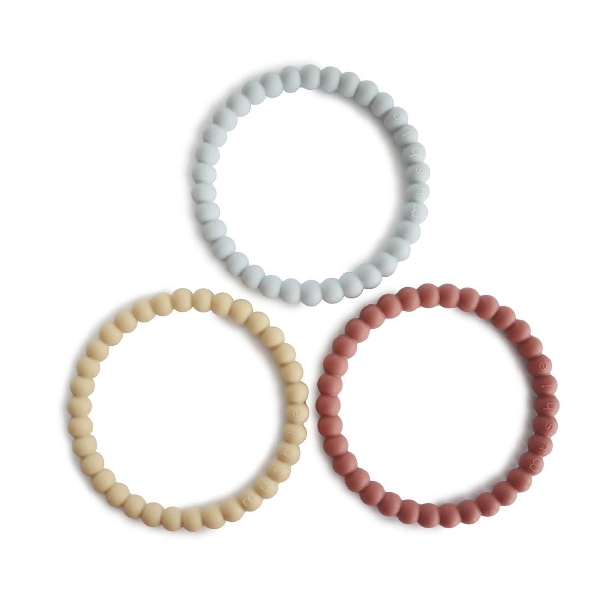 MUSHIE · bijtring armband siliconen (berry / marigold / khaki)