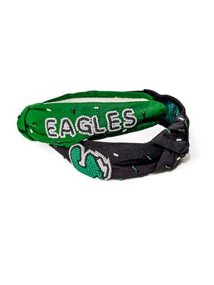 Headband with "EAGLES" in white beads and green "S" logo, cushioned fabric with scattered beads.