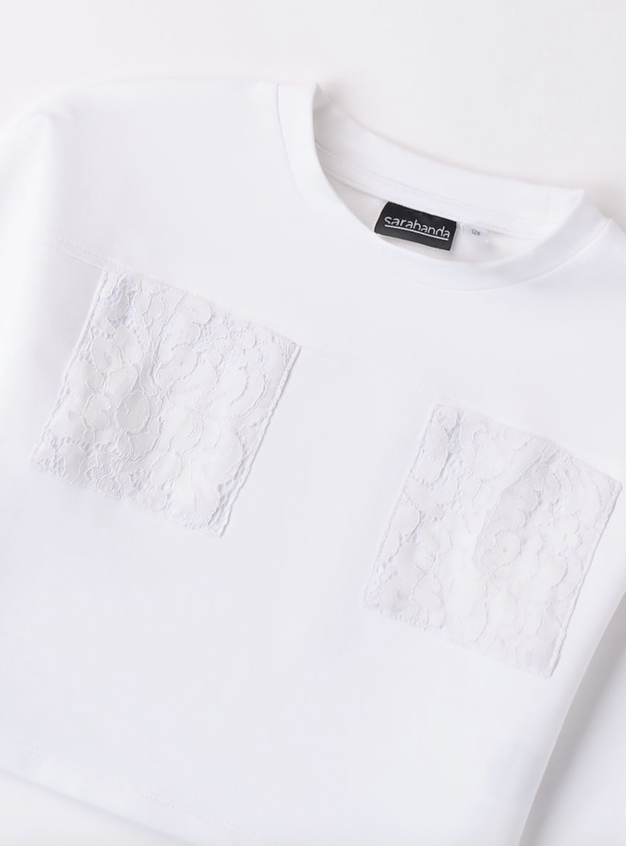 Sarabanda- sweater wit met kanten zakjes