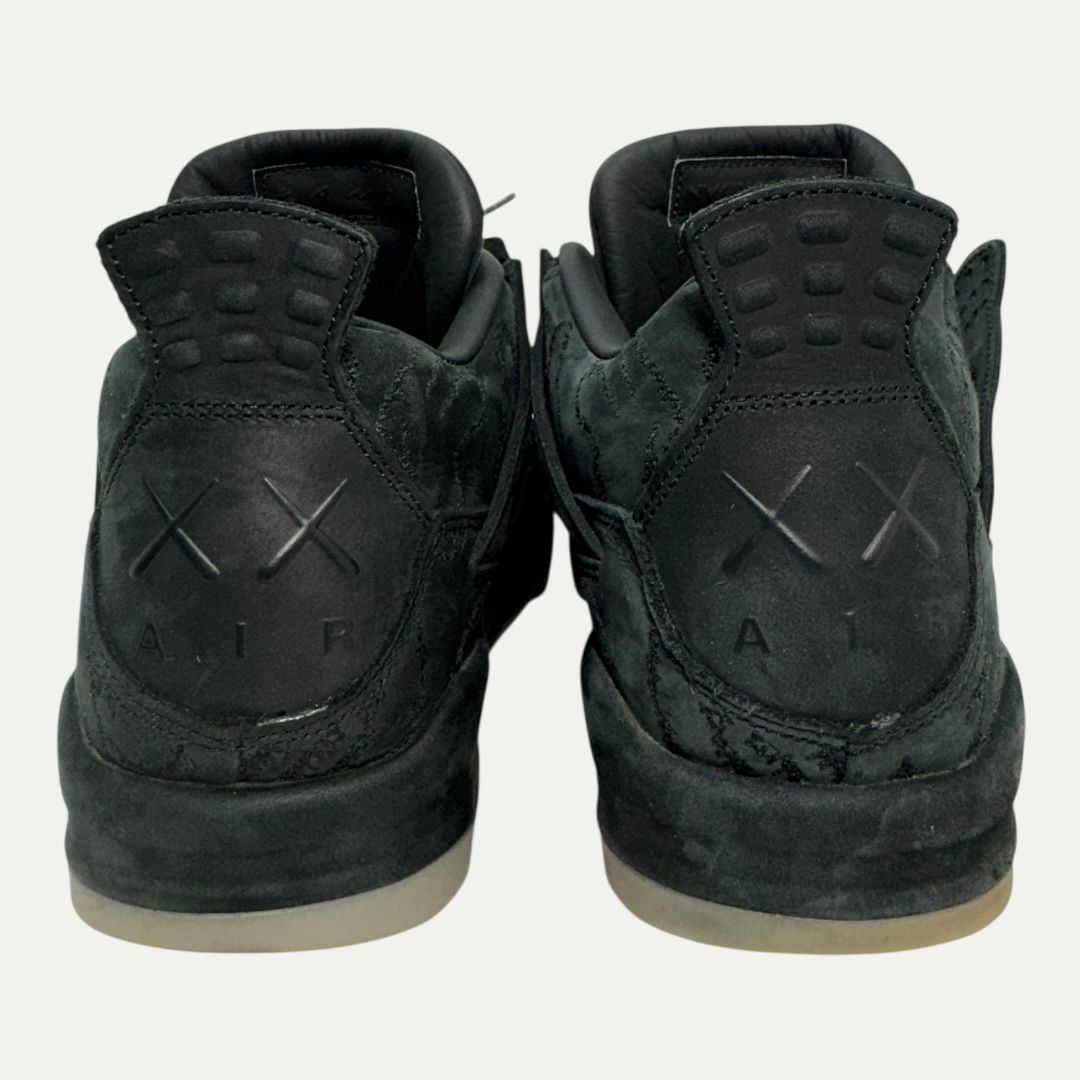Jordan 4 KAWS Black Sz 10