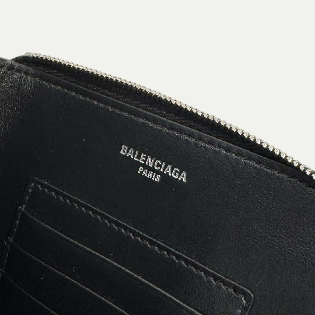 Balenciaga Passport Wallet.