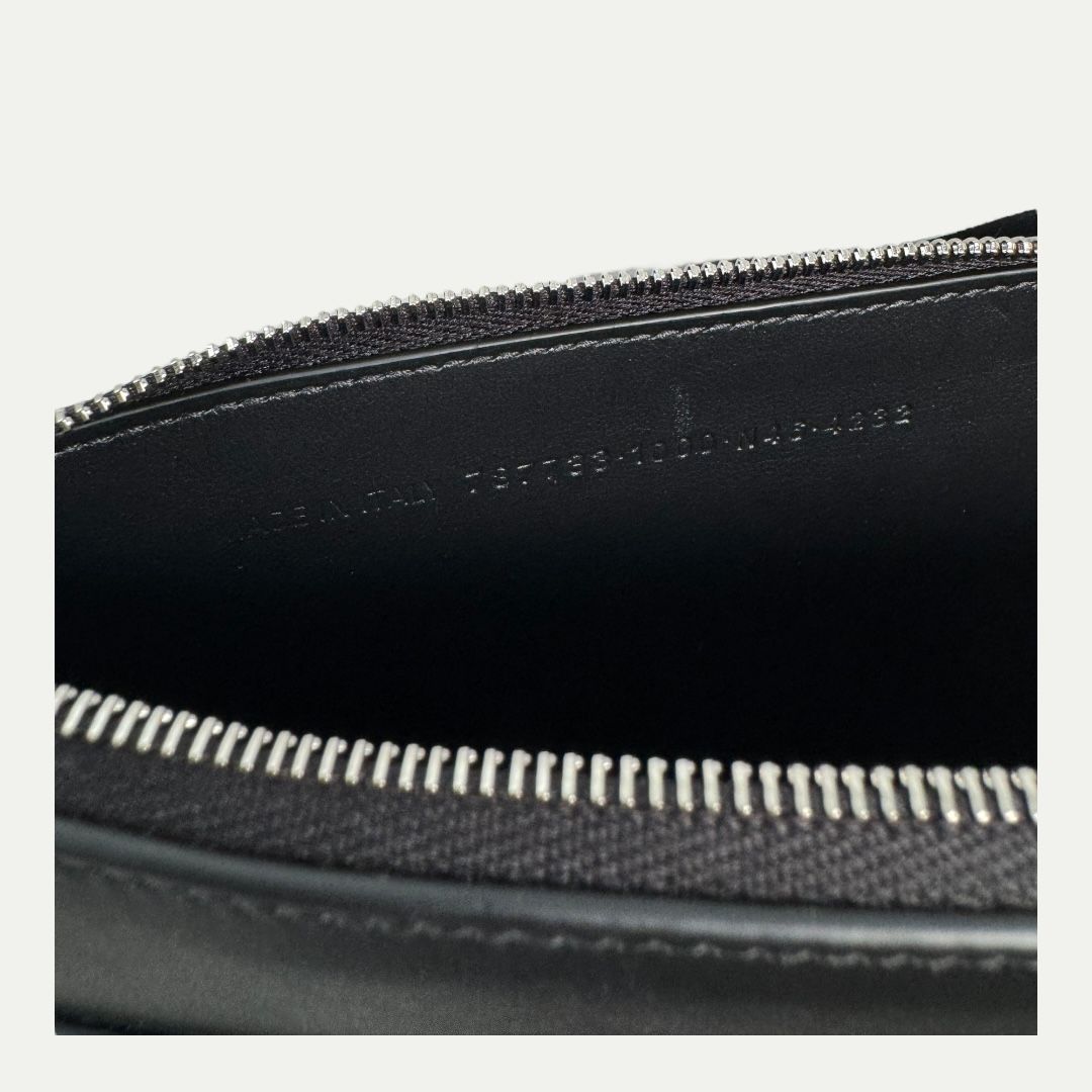 Balenciaga Passport Wallet.