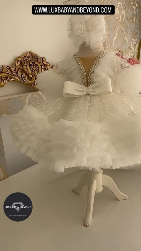 Luxurious White fairy dress with frill tail and headband.