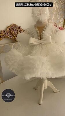 Luxurious White fairy dress with frill tail and headband.