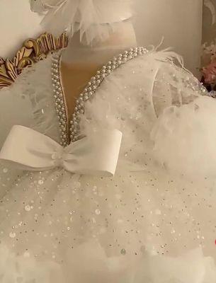 Luxurious White fairy dress with tail, headband and pearl shoes.