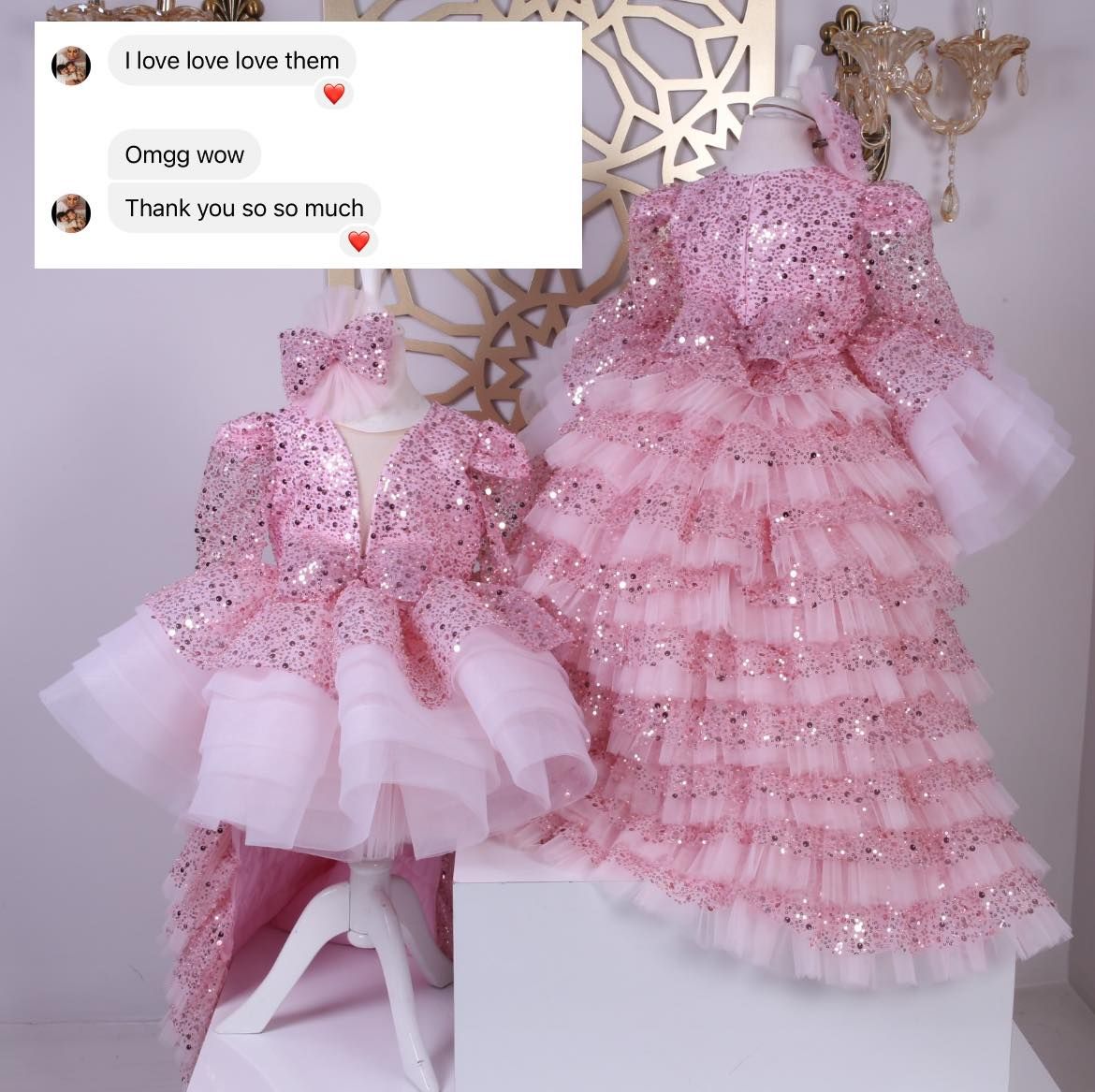 Luxurious baby pink dress with frill trail and headband.