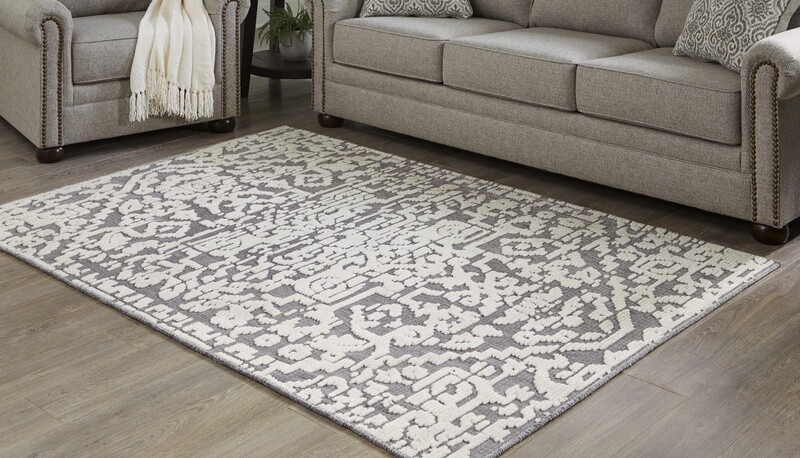 Oddetteley 4'11"x7'x2" Area Rug