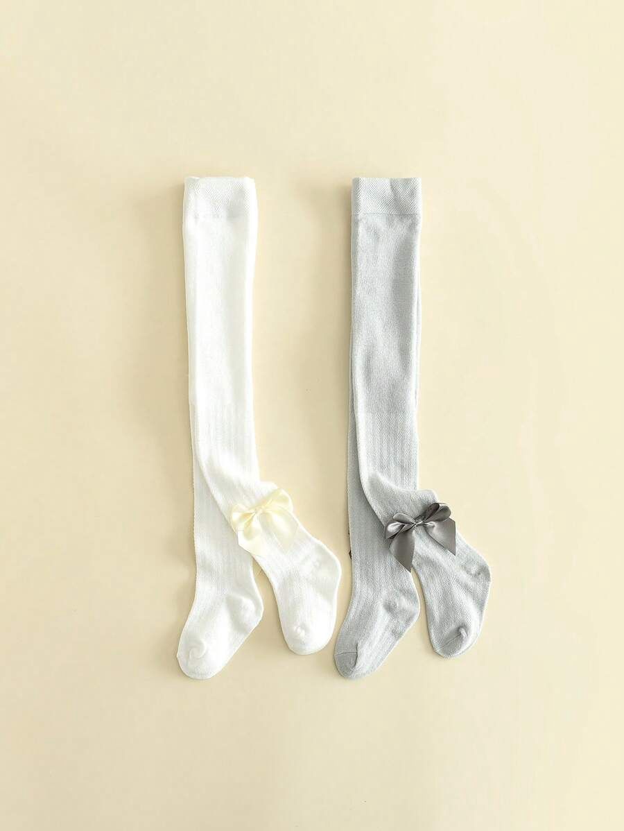 Soft And Comfortable Hollow Out Breathable Girl Tight Leggings With Bowknot Decoration,