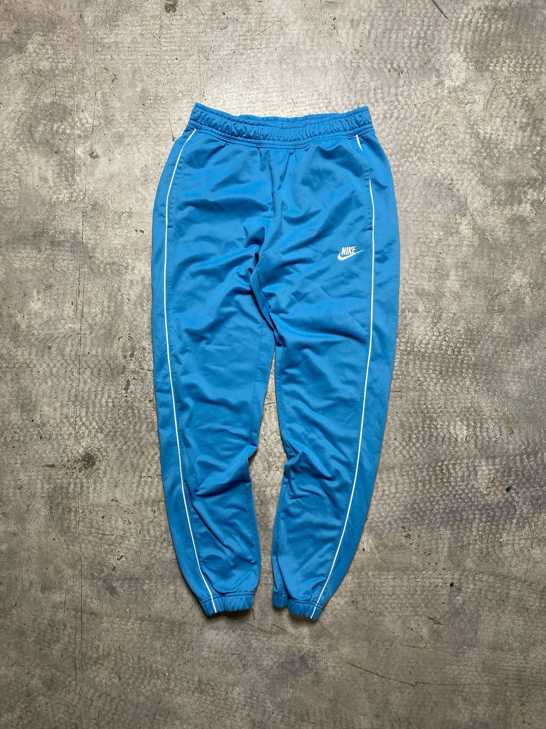Spodnie Nike Swoosh Basic Sweatpants Light-Blue 35-40 cm pas