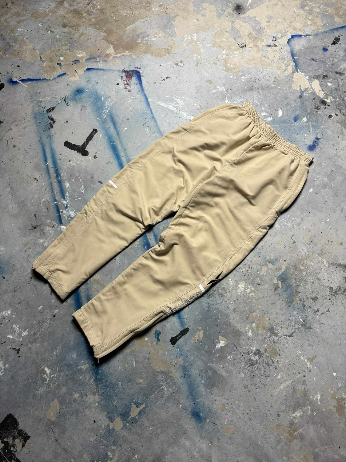 Spodnie Reebok Panels Zip Pants Beige 34-42 cm pas