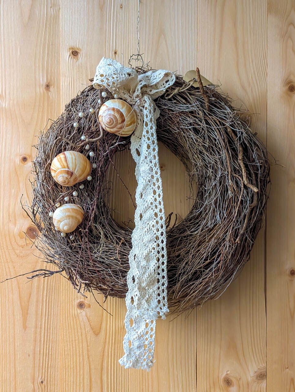 Kranz mit Schneckenhäuser