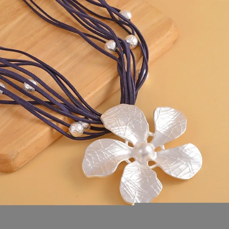 Jasmine Flower Pendant Necklace 20-23 Inches in Silvertone on Navy Multi Strand Faux Leather