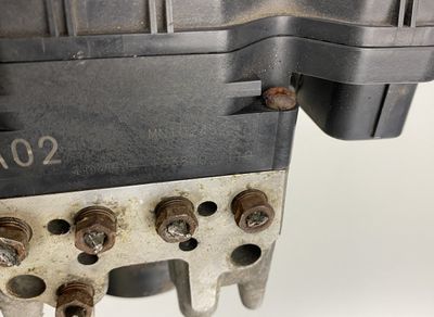 1338007110 MN102452 Гидроблок ABS / насос MITSUBISHI L200 IV / TRITON (KA, KB) (2005-2015)