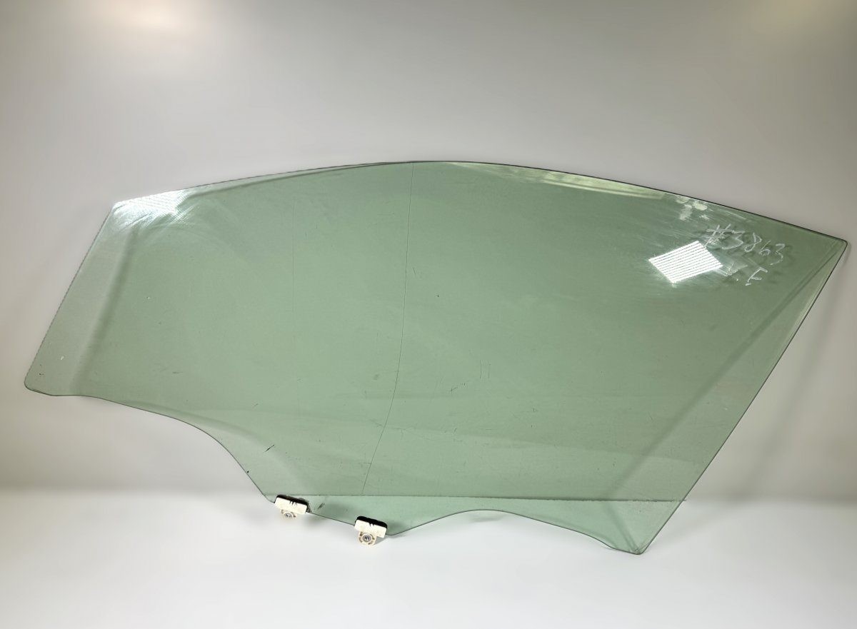 Subaru Legacy Door window glass front left