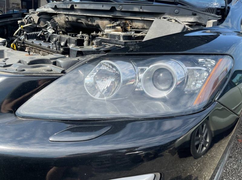 EH1051040 Headlight left MAZDA CX-7 (ER) (2006-2014)