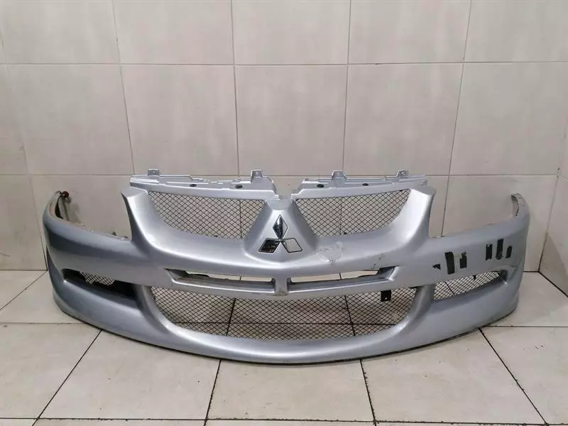 Mitsubishi Lancer MITSUBISHI Lancer EVOLUTION VII 7 EVO Front Bumper MN161109HA Front Bumper Body type: Saloon
Fuel: Petrol