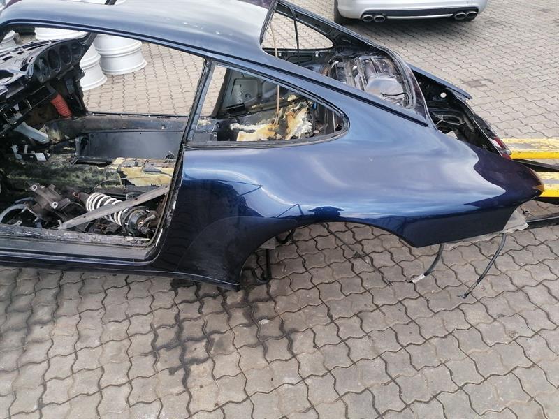 Porsche 911 (964) Porsche 911 993 rear panel 99350390100 left wheel arch side part left fender Body type: Coupe
Fuel: Petrol