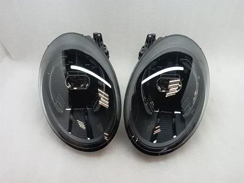 Porsche 911 (992) Porsche 911 992 Headlight Set 992941015AE USA 992 MK2 FACELIFT Headlamp Set Body type: Coupe
Fuel: Petrol