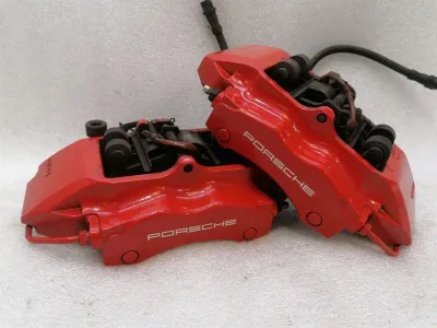 Porsche 911 997 Aizmugurējo bremžu suportu komplekts 99635242560 Aizmugurējais bremžu suports