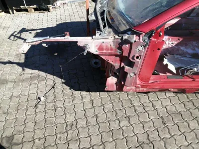 Aston Martin Vantage V12 kreisā šasijas kāja AG33-C10027-AA priekšējā kreisā riteņa arka