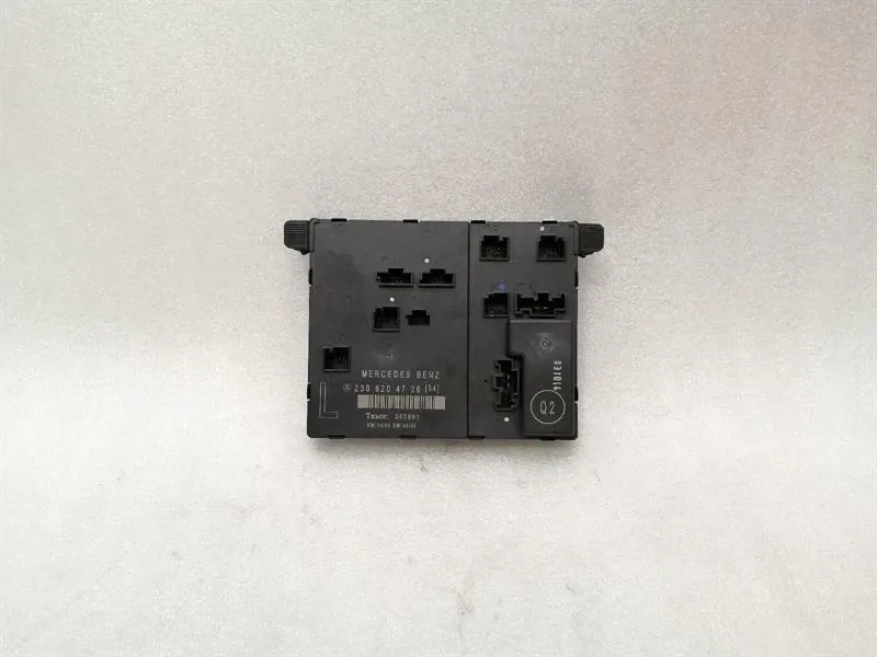 Mercedes SL R230 left door module A2308204726 door control unit left
