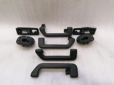 Porsche Cayenne 958 92a Jumta roktura komplekts 7P0857644B Turēšanas roktura salona komplekts