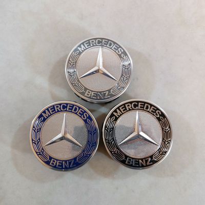 Oryginalny kapturek środkowy Mercedes Benz OEM Logo chromowany gwiazda niebieski czarny szary 75 mm