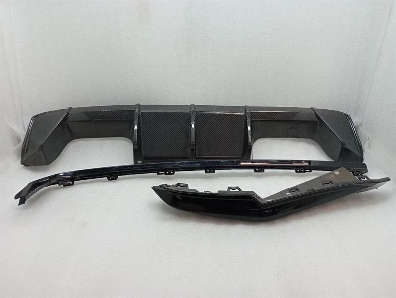 BMW 4 (G22 / G23 / G26)  BMW 4 G83 M4 rear bumper 8075031 carbon with defects rear bumper- Body type: Convertible
Fuel: Petrol