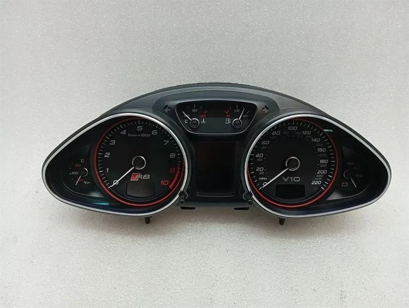 Audi R8 AUDI R8 TYPE 42 V10 5.2 SPYDER INSTRUMENT CLUSTER 420920981P SPEEDOMETER MPH UK- Body type: Convertible
Fuel: Petrol