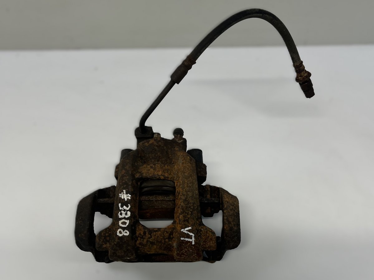 Jeep Grand Cherokee (WK) Brake caliper — rear left Brake caliper — rear left — JEEP GRAND CHEROKEE...