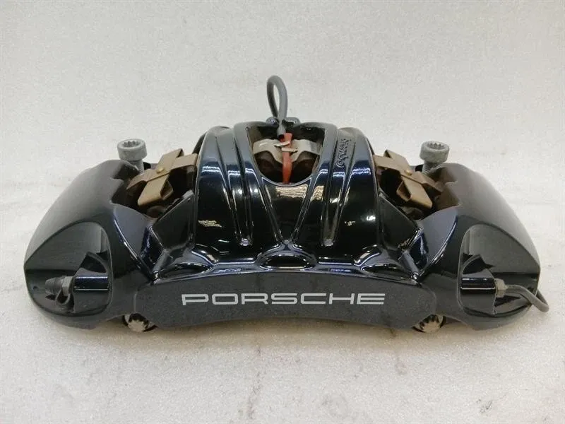 Porsche 911 (992) Porsche 911 992 Left Front Caliper 992615123AR FL Brake Caliper Front Left GTS Body type: Targa
Fuel: Hybrid