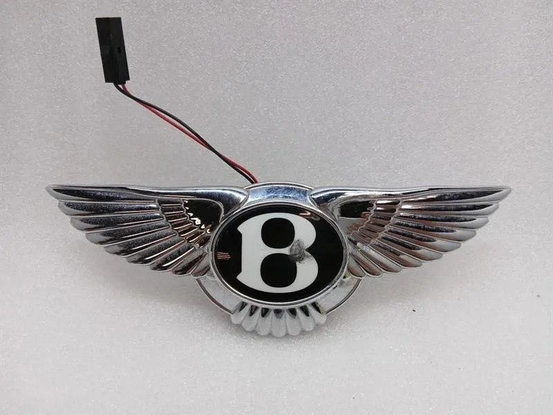 Bentley Continental GT, GTC, Flying Spur BENTLEY CONTINENTAL FLYING TRACK Switch 3W0853630J BOAT LID Switch Emblem Body type: Saloon
Fuel: Petrol