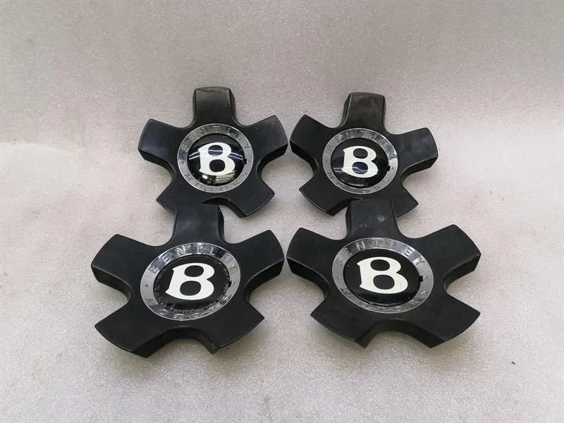 Bentley Continental GT, GTC, Flying Spur Bentley Continental GT W12 Center Cap Set 3W0601161CN Hubcap 3W0601161CN Body type: Coupe
Fuel: Petrol
