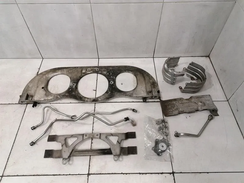 Porsche 911 (996) Porsche 911 996 Turbo Oil Lines 99610721676 Intake Line 99637501300 Bracket Body type: Coupe
Fuel: Petrol
