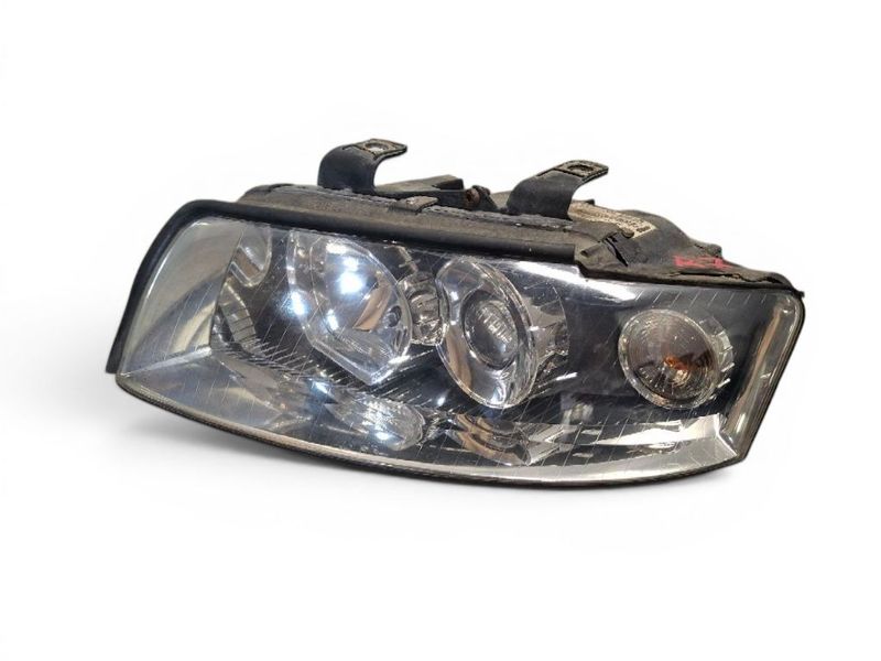 89309150 8E0990007S Reflektor lewy AUDI A4 (B6) (2000-2004)