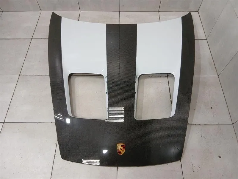 Porsche 911 (992) Porsche 911 992 GT3 Carbon Bonnet 9GT823025G173 Front Cover Hood Weissach OEM Body type: Coupe
Fuel: Petrol