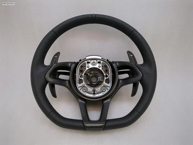 McLaren 600LT 570S Carbon Steering Wheel 13N1131CP CARBON Steering Wheel PADDLES Brand/Model: McLaren 570S
Year: 2019
Engine: 39...