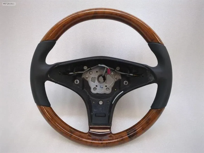 Mercedes-Benz A (W168) MERCEDES SL R230 PADDLE LEATHER STEERING WHEEL A2304602718 STEERING WHEEL AMG MOPF WOOD Body type: Convertible
Fuel: Petrol