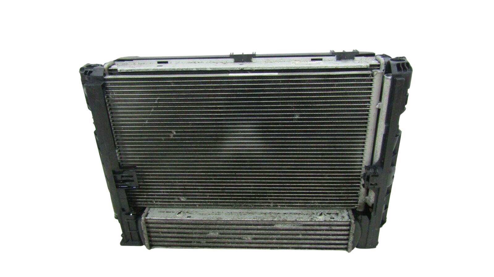 BMW 3 (E90 / E91 / E92 / E93) Radiator set BMW 3 SERIES Radiator set OEM 7788903

Part cod...