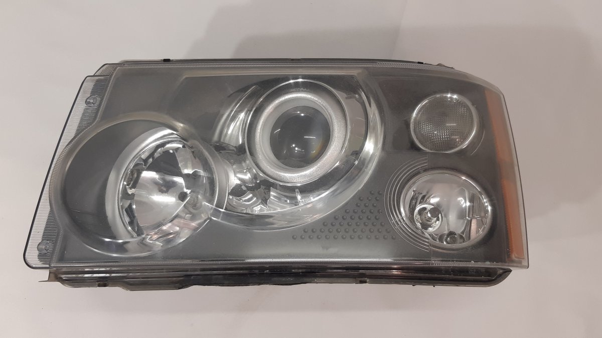 Land Rover Range Rover Sport headlight left LAND ROVER RANGE ROVER SPORT I (L320) (2005-201...