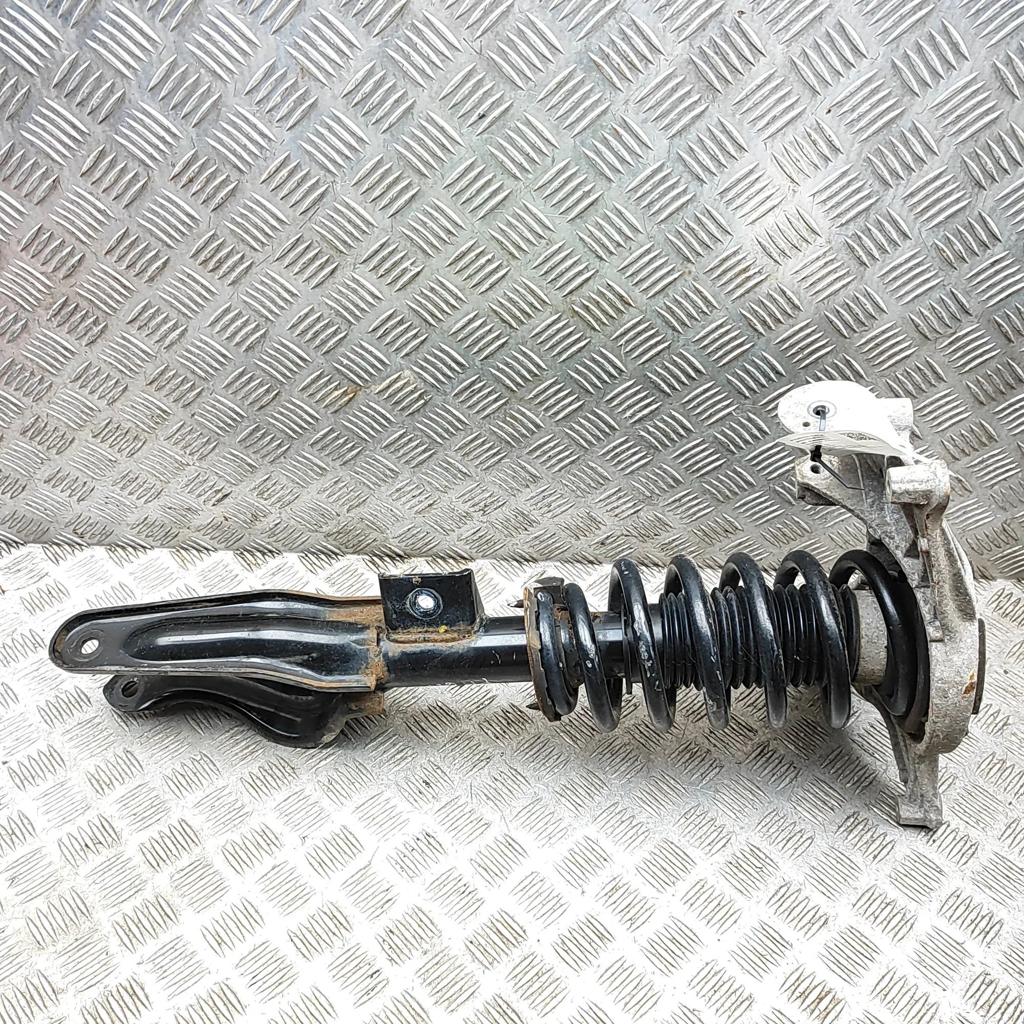 Tesla Model Y Shock absorber — front left Shock absorber — front left — TESLA MODEL Y (5Y...