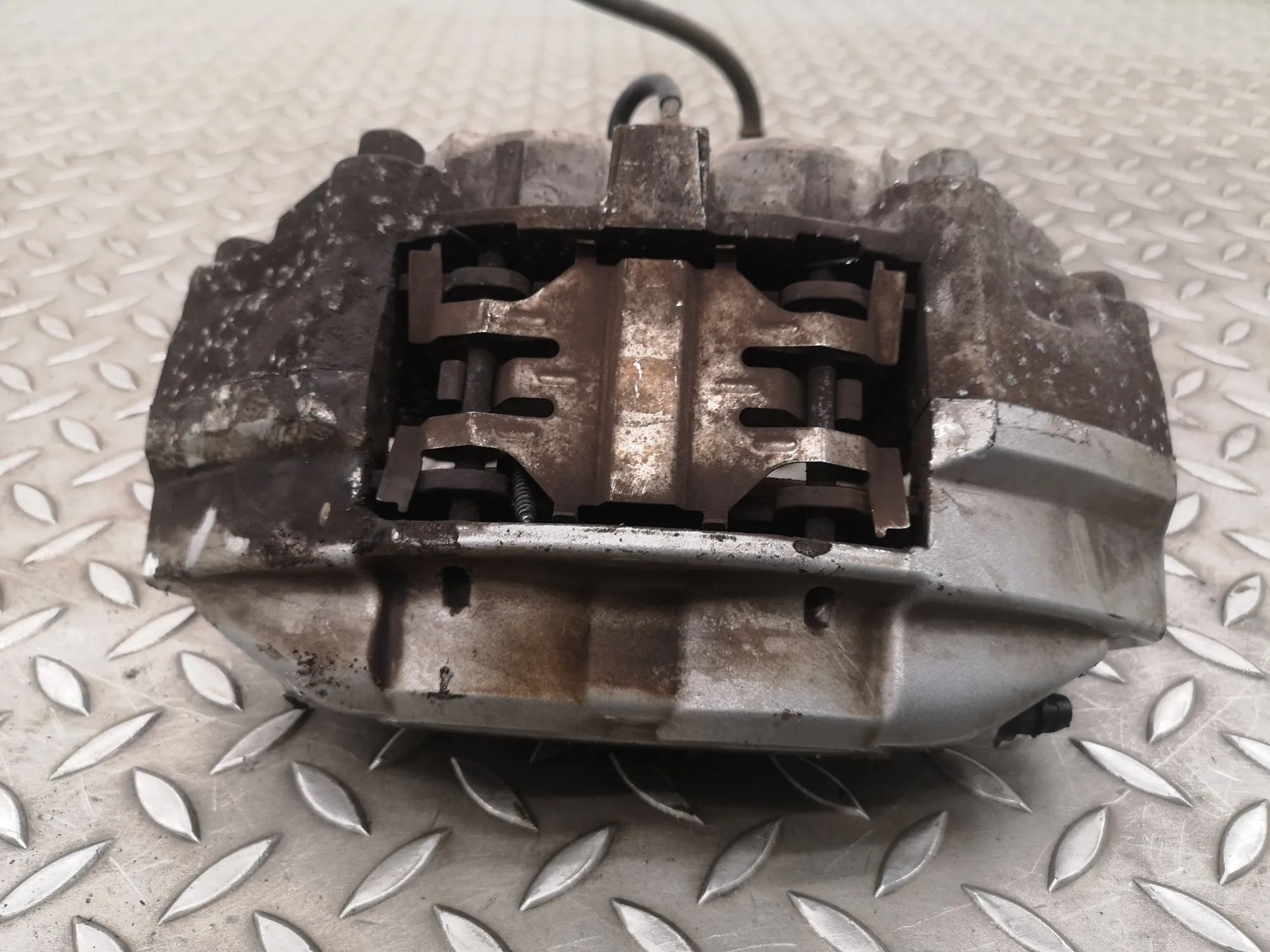 Infiniti Q50 Front Left Brake Caliper Front left brake caliper — INFINITI Q50 (2014-2...